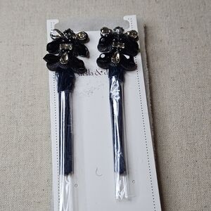 Navy blue feather earrings. Take you from day to evening.